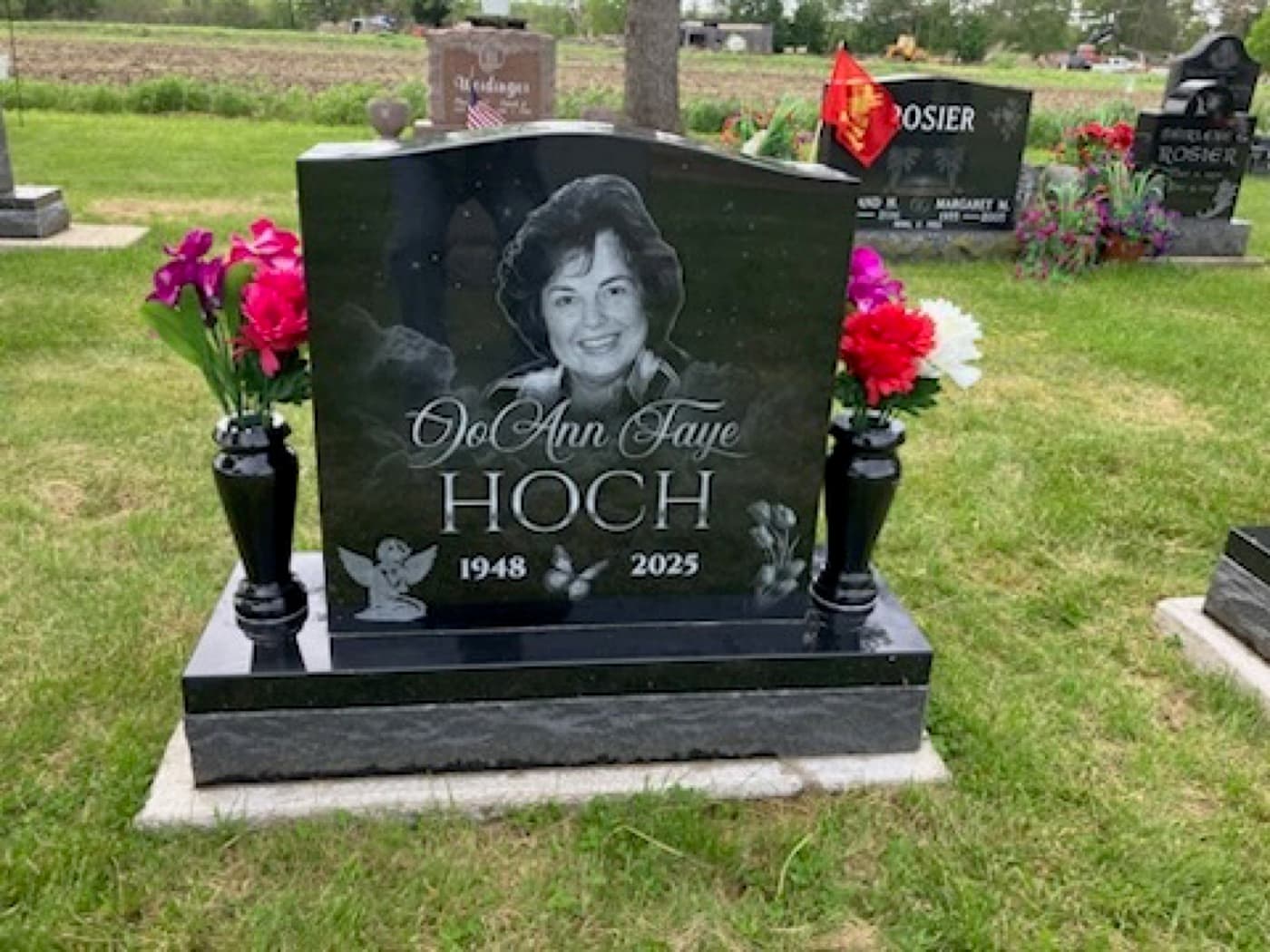 A completed Citizen Memorials upright headstone installed at a cemetery